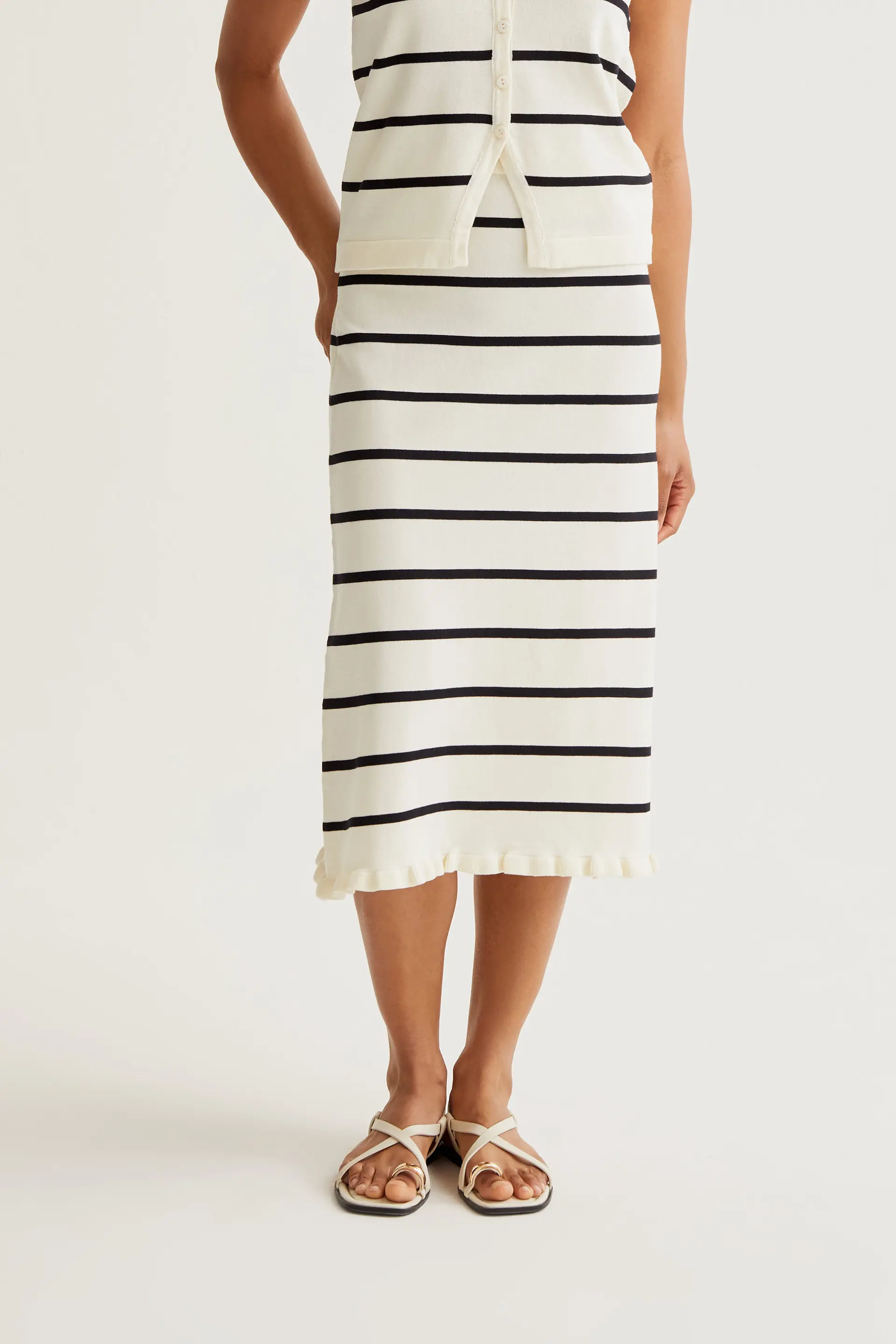 Falda midi de punto con estampado de rayas blanco y negro